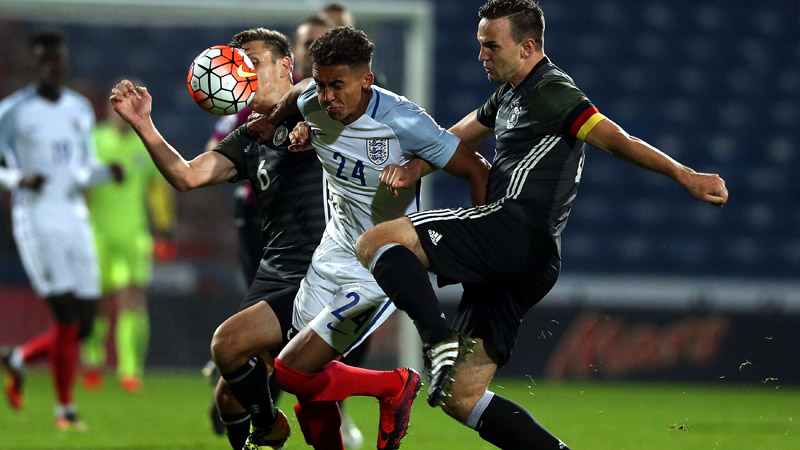England U20s striker Dominic Calvert-Lewin breaks past two Germany defenders