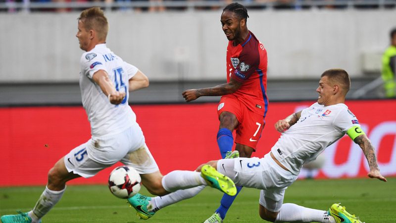 Raheem Sterling sees a shot blocked in the game with Slovakia