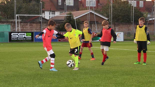 Local youngsters enjoy an FA Skills session on the new 3G surface in Lancing