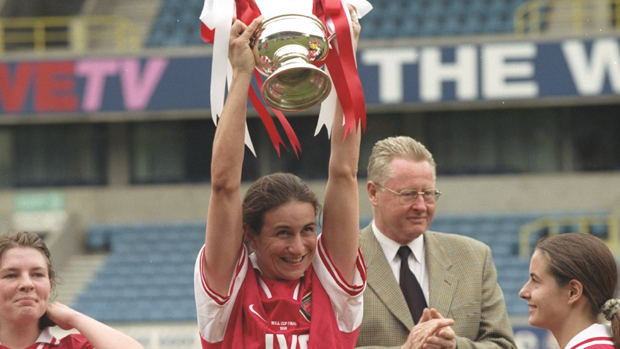 Marieanne Spacey holds aloft The FA Women